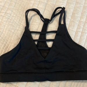 Black strappy bra size med, fits like a small